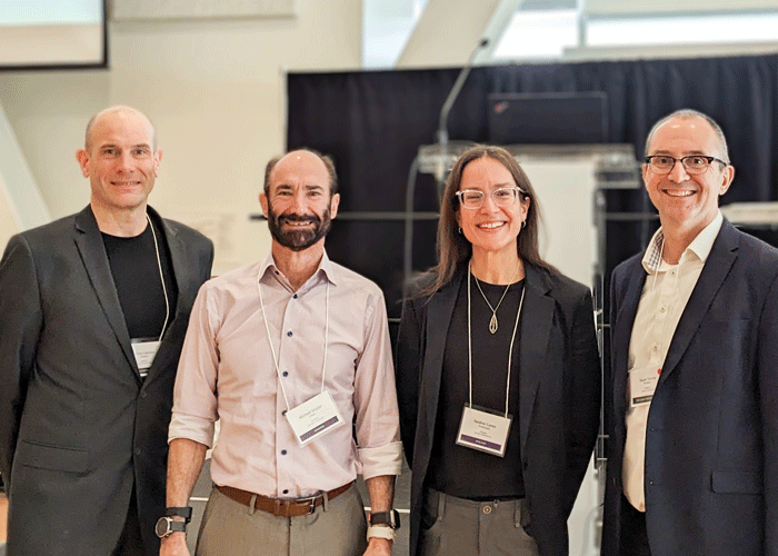 Precision Health former lead Dr. Chris Carlsten and current lead Dr. Stuart Turvey pose with keynote speakers Drs. Nadine Caron and Michael Snyder